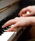 Hands playing piano