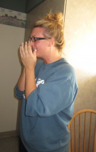 Louisa hears the name.